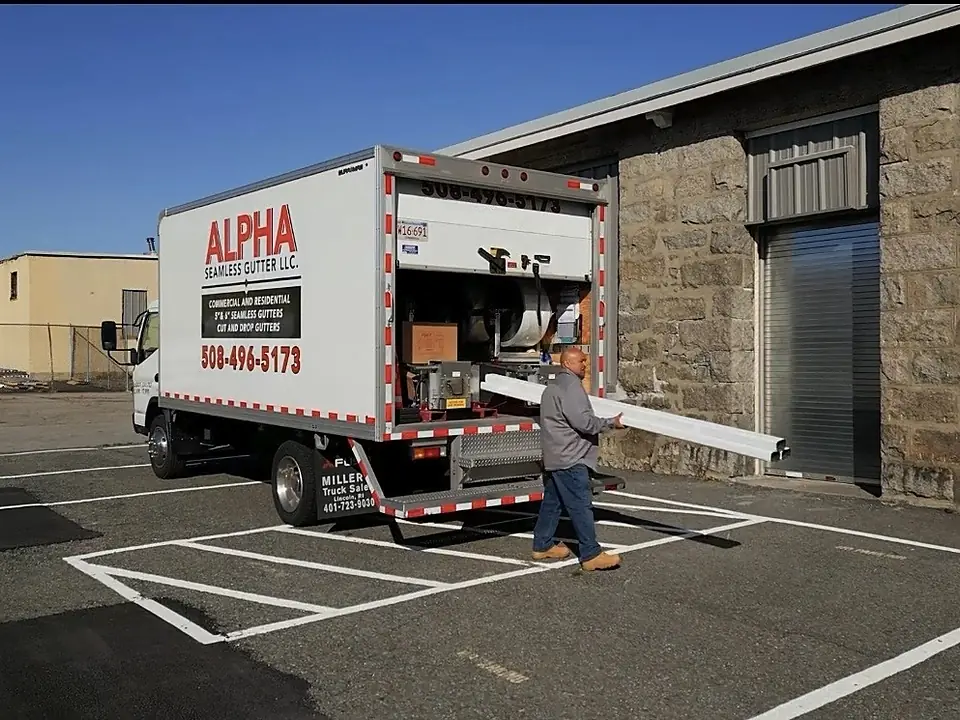 Alpha Seamless Gutter box truck fabricating a long seamless gutter run
